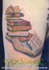 Stack of 8 antique books one open with bookmark